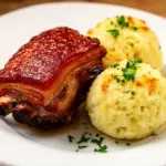 Oktoberfest Schweinshaxe mit Knödeln - featured image